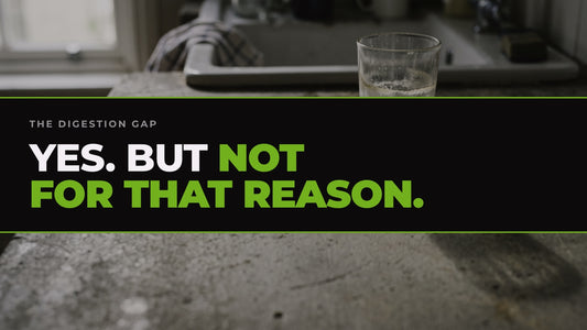A half-drunk glass of cloudy liquid abandoned on a kitchen worktop by the sink, captioned “Yes. But not for that reason.”
