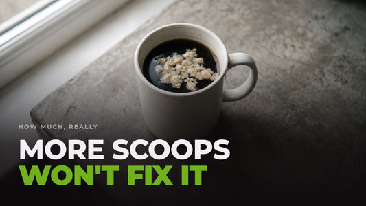 A mug of black coffee on a windowsill with pale collagen powder clumping unmixed on the surface, captioned “More scoops won't fix it”.