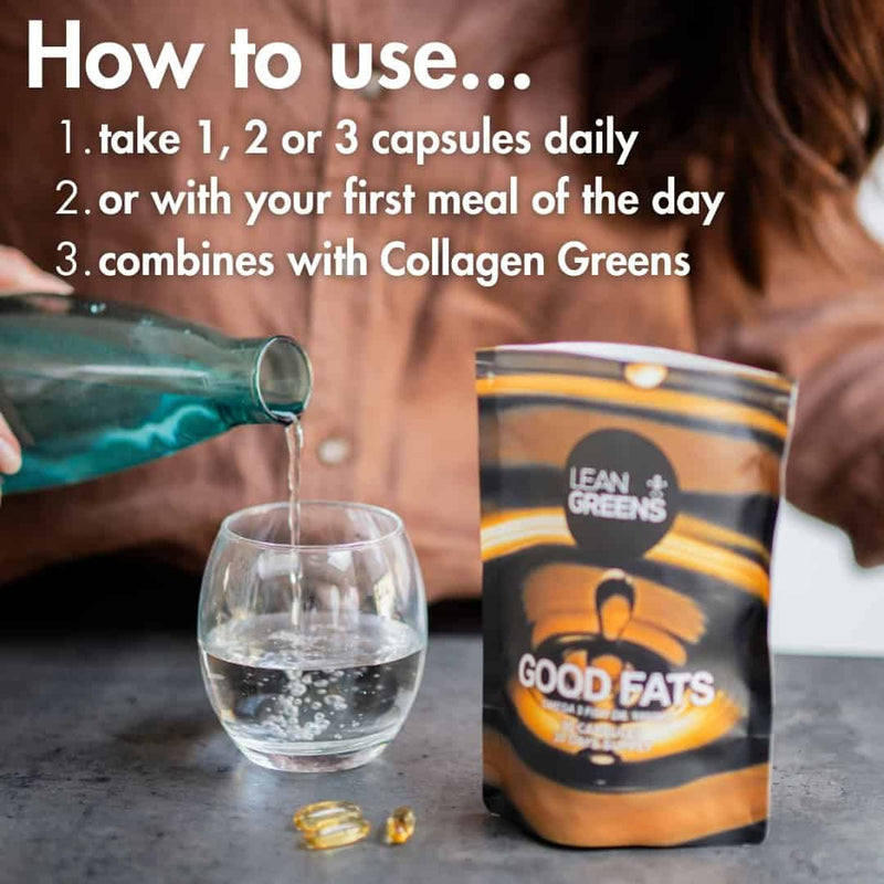 Person pouring liquid from a bottle into a glass with a supplement container labeled 'Good Fats' and 'Lean Greens'. How to take Omega 3 softgels