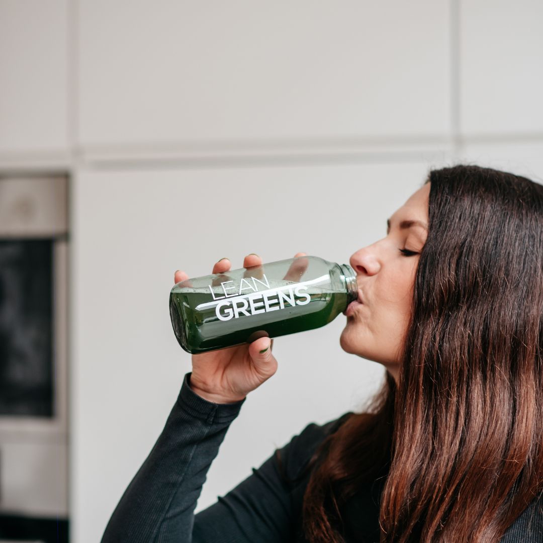 Drinking a greens powder drink